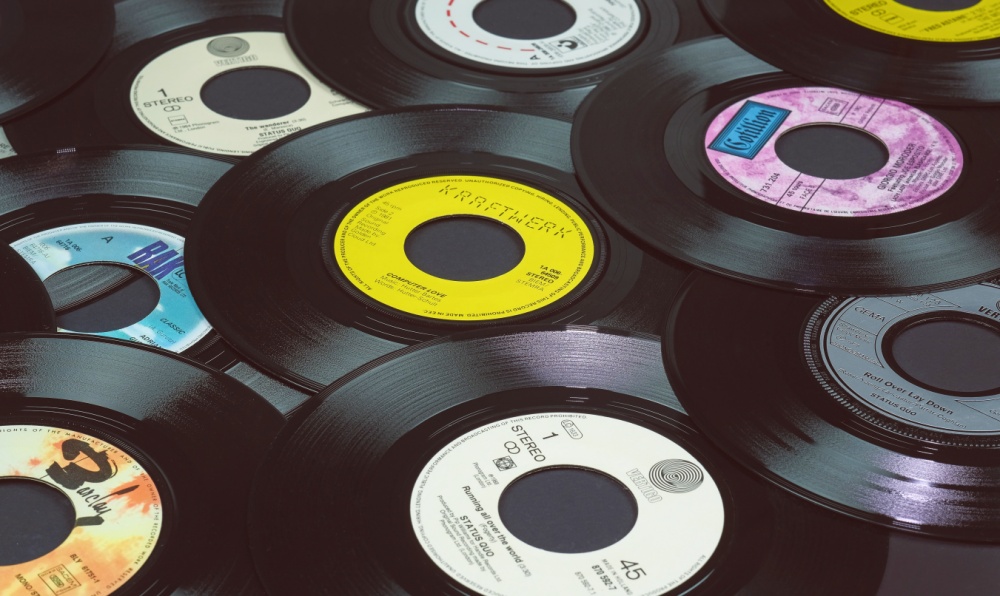 Several vinyl records with color labels